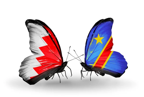 Butterflies with Bahrain and Kongo flags on wings — Stock Photo, Image