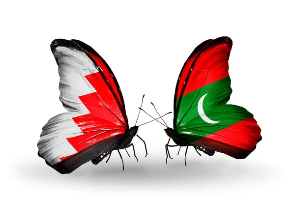 Бабочки с флагом Бахрейна и Мальдив на крыльях — стоковое фото