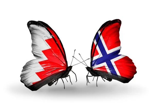 Butterflies with Bahrain and Norway flags on wings — Stock Photo, Image