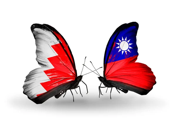 Butterflies with Bahrain and Taiwan flags on wings — Stock Photo, Image