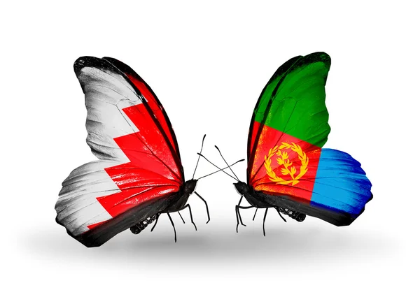 Butterflies with Bahrain and Eritrea flags on wings — Stock Photo, Image