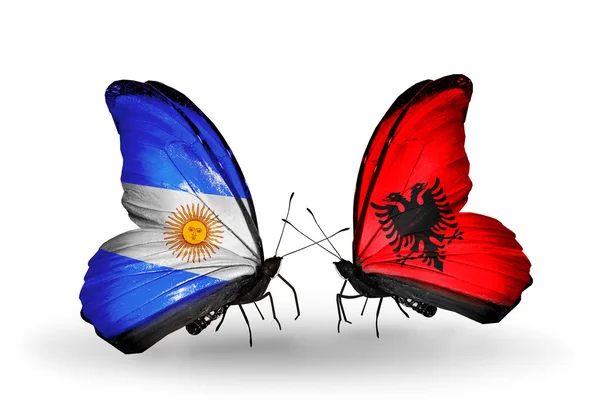 Butterflies with Argentina and Albania flags on wings — Stock Photo, Image