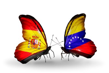 Kelebek kanatları üzerinde İspanya ve venezuela bayraklı