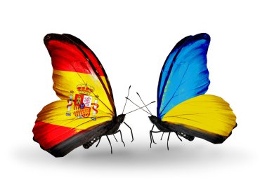 Kelebek kanatları üzerinde İspanya ve Ukrayna bayraklı