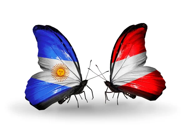 Butterflies with Argentina and Austria flags on wings — Stock Photo, Image