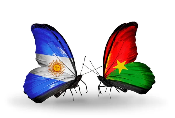 Butterflies with Argentina and Burkina Faso flags on wings — Stock Photo, Image