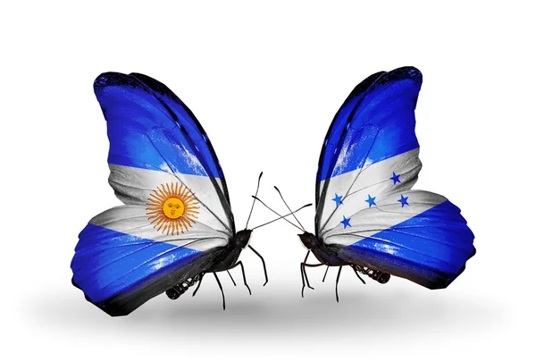 Butterflies with Argentina and Honduras flags on wings — Stock Photo, Image