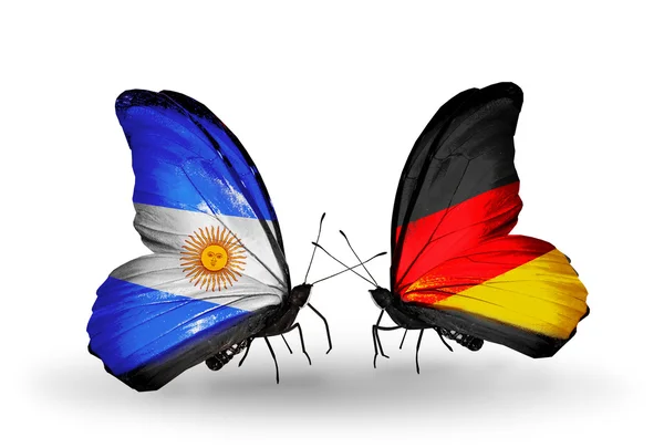 Butterflies with Argentina and Germany flags on wings — Stock Photo, Image