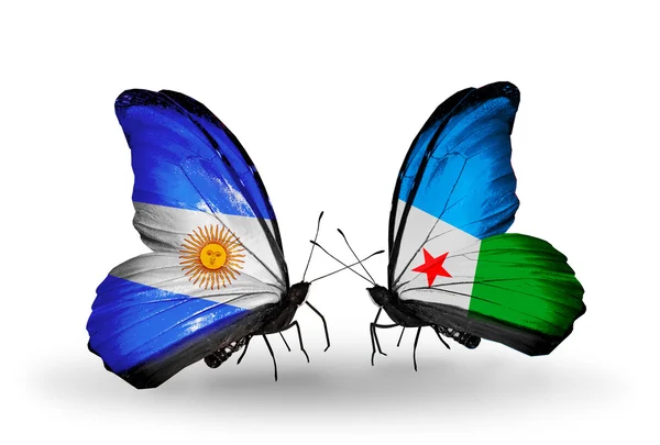 Motýli s Argentinou a Džibuti vlajky na křídlech — Stock fotografie
