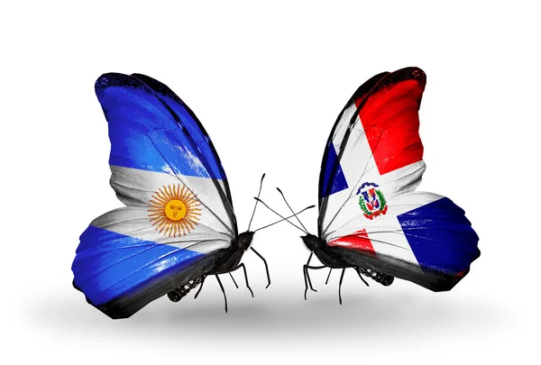 Butterflies with Argentina and Dominicana flags on wings — Stock Photo, Image