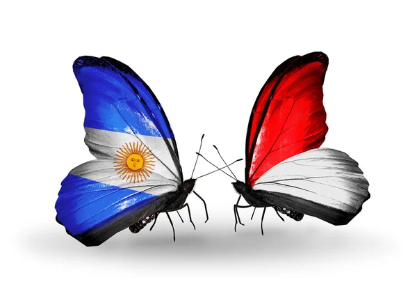 Butterflies with Argentina and Monaco, Indonesia flags on wings — Stock Photo, Image