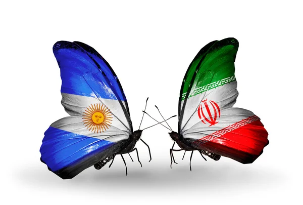 Farfalle con bandiere Argentina e Iran sulle ali — Foto Stock