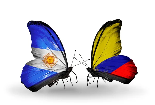 Butterflies with Argentina and Columbia flags on wings — Stock Photo, Image