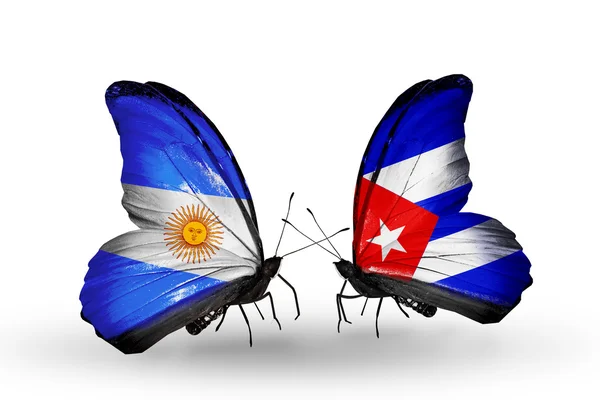 Butterflies with Argentina and Cuba flags on wings — Stock Photo, Image