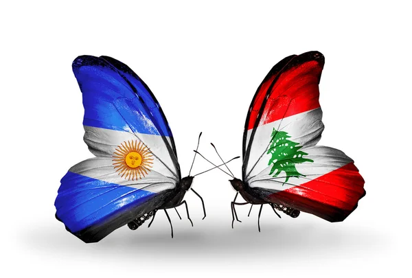 Schmetterlinge mit argentinischen und libanonischen Flaggen auf Flügeln — Stockfoto