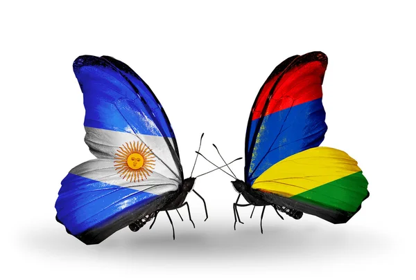 Butterflies with Argentina and Mauritius flags on wings — Stock Photo, Image