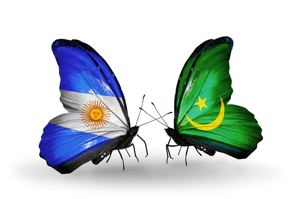 Motýli s Argentinou a Mauretánie vlajky na křídlech — Stock fotografie