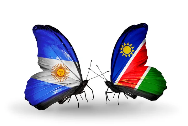 Borboletas com bandeiras da Argentina e Namíbia em asas — Fotografia de Stock
