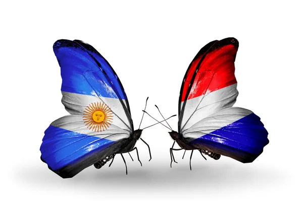 Pillangók szárnyain Argentína és Hollandia zászlókkal — Stock Fotó