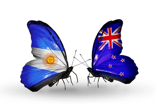 Butterflies with Argentina and New Zealand flags on wings — Stock Photo, Image