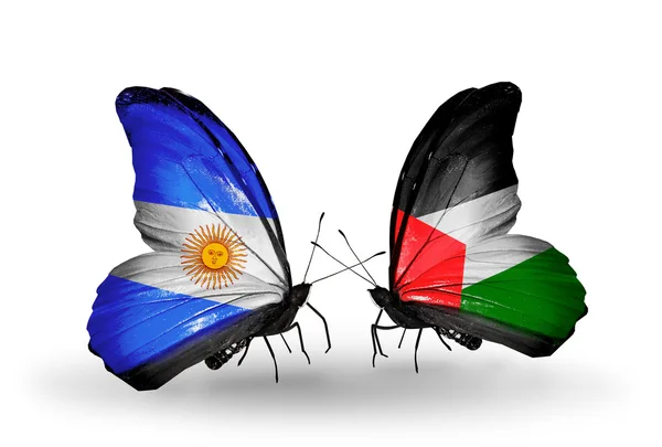 Borboletas com bandeiras da Argentina e Palestina em asas — Fotografia de Stock