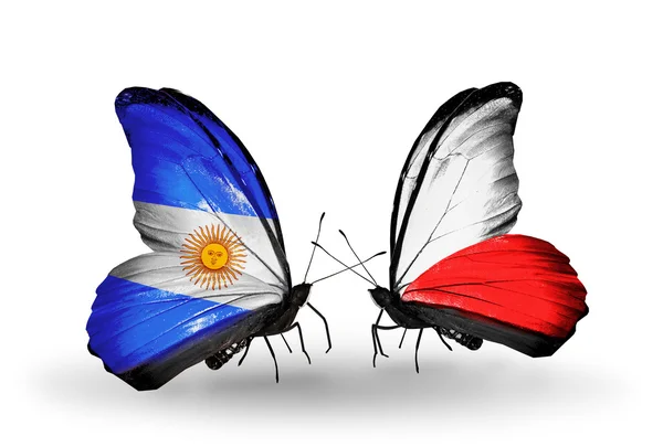 Butterflies with Argentina and Poland flags on wings — Stock Photo, Image