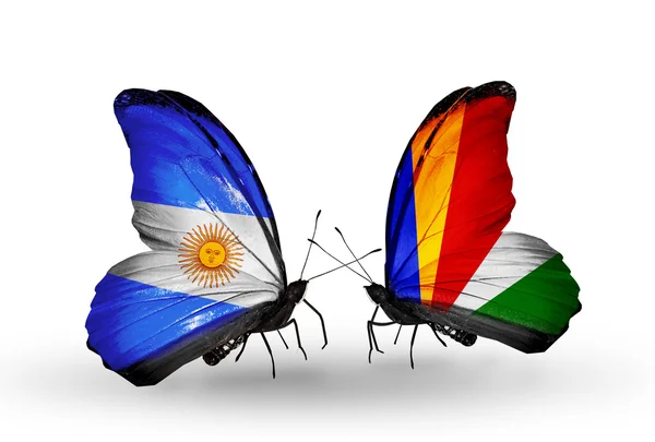 Butterflies with Argentina and Seychelles flags on wings — Stock Photo, Image