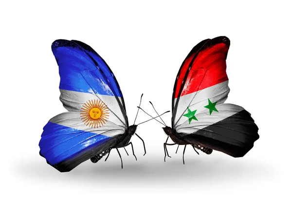 Papillons avec l'Argentine et la Syrie drapeaux sur les ailes — Photo