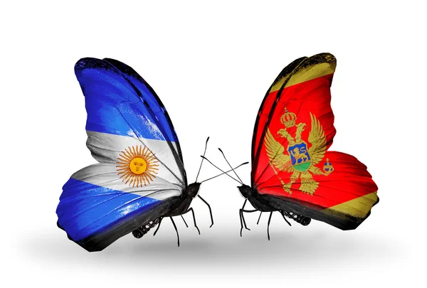 Motýli s Argentinou a Černá Hora vlajky na křídlech — Stock fotografie
