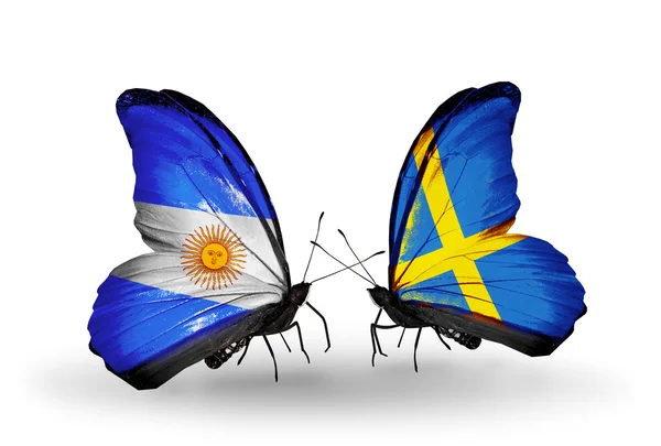 Butterflies with Argentina and Sweden flags on wings — Stock Photo, Image