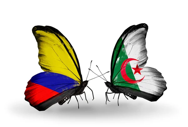 Mariposas con banderas de Colombia y Argelia en alas —  Fotos de Stock