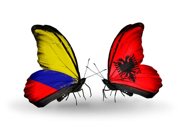 Butterflies with Columbia and Albania flags on wings — Stock Photo, Image