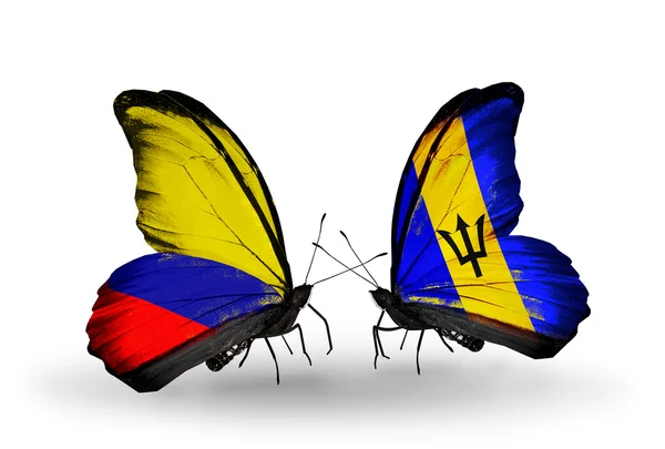 Butterflies with Columbia and Barbados flags on wings — Stock Photo, Image