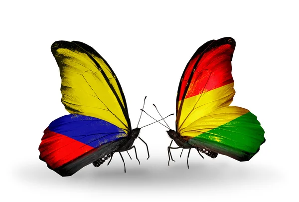 Butterflies with Columbia and Bolivia flags on wings — Stock Photo, Image