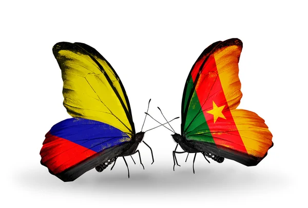 Papillons avec drapeaux Columbia et Cameroun sur les ailes — Photo