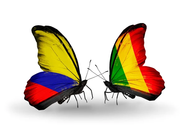 Kelebek kanatları üzerinde columbia ve mali bayraklı — Stok fotoğraf