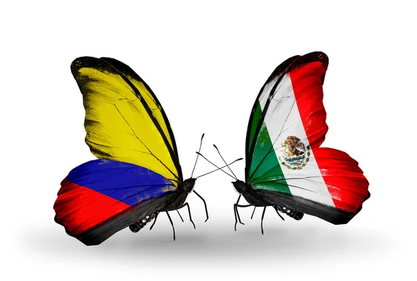 与哥伦比亚和墨西哥的国旗在翅膀上的蝴蝶 — 图库照片