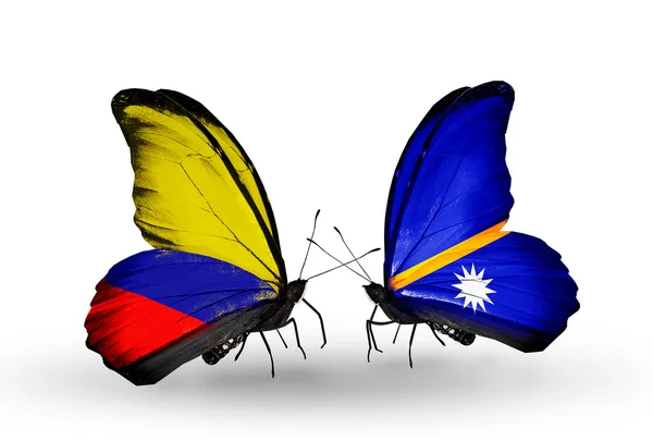 Mariposas con banderas de Columbia y Nauru en alas — Foto de Stock