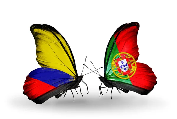 Butterflies with Columbia and Portugal flags on wings — Stock Photo, Image