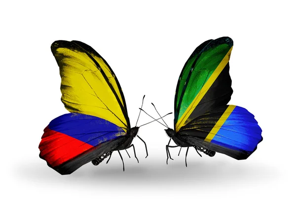 Бабочки с флагами Колумбии и Танзании на крыльях — стоковое фото