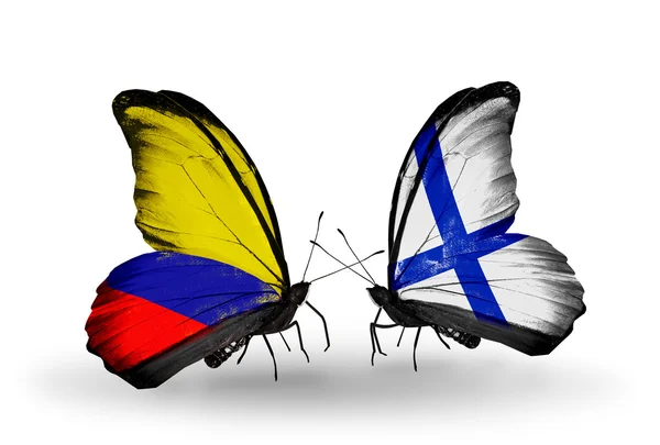Πεταλούδες με την columbia και Φινλανδία σημαίες με φτερά — Φωτογραφία Αρχείου