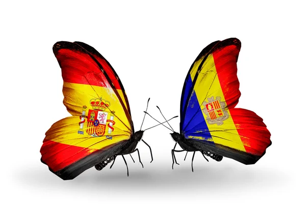 Motyle z Hiszpanii i Andory flagi na skrzydłach — Zdjęcie stockowe