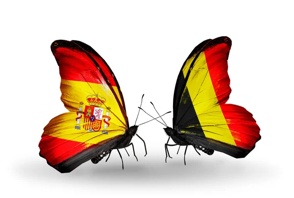 Kelebek kanatları üzerinde İspanya ve Belçika bayrağı ile — Stok fotoğraf