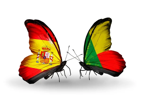 Farfalle con bandiere Spagna e Benin sulle ali — Foto Stock