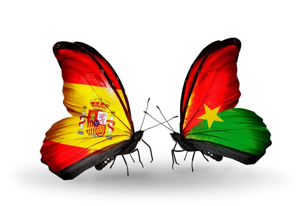 Motyle z Hiszpanii i burkina faso flagi na skrzydłach — Zdjęcie stockowe