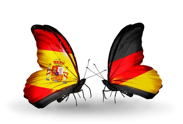 Mariposas con banderas de España y Alemania en alas — Foto de Stock