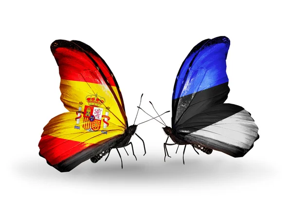 Butterflies with Spain and Estonia flags on wings — Stock Photo, Image