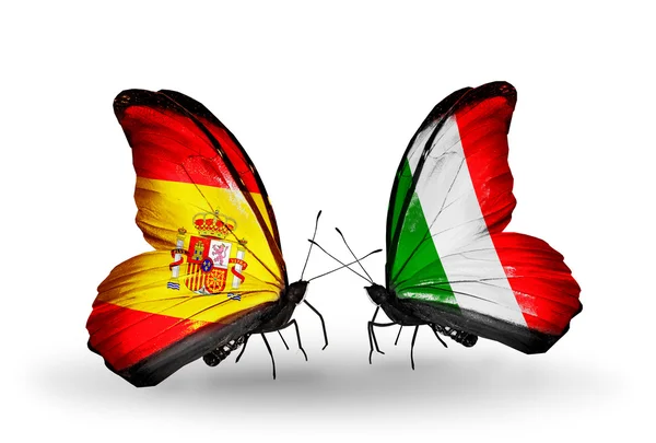 Mariposas con banderas de España e Italia en alas — Foto de Stock