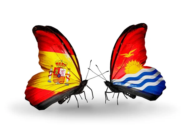 Butterflies with Spain and Kiribati flags on wings — Stock Photo, Image