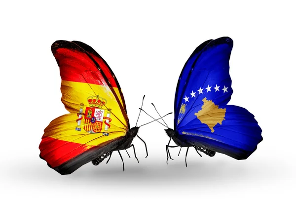 Papillons avec des drapeaux d'Espagne et du Kosovo sur les ailes — Photo